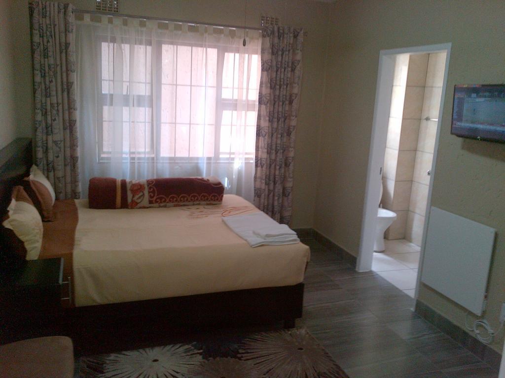 Chisam Guest Lodge Pty Ltd Γιοχάνεσμπουργκ Δωμάτιο φωτογραφία